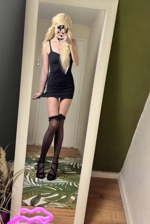Tight and short little black dress 