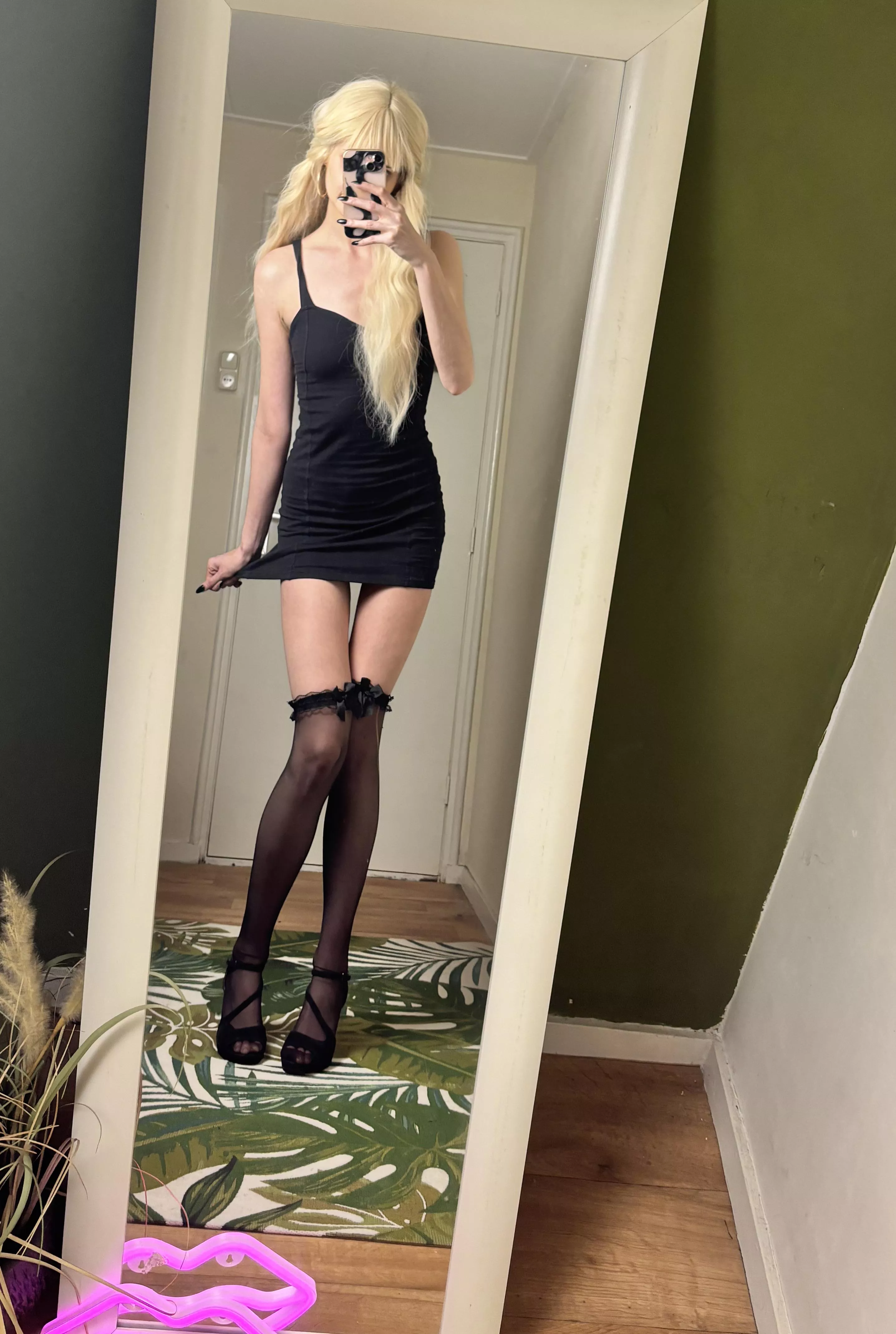 Tight and short little black dress 