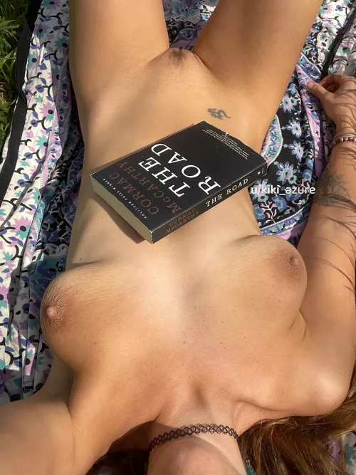 All I need is a good book and sunshine on my nude body
