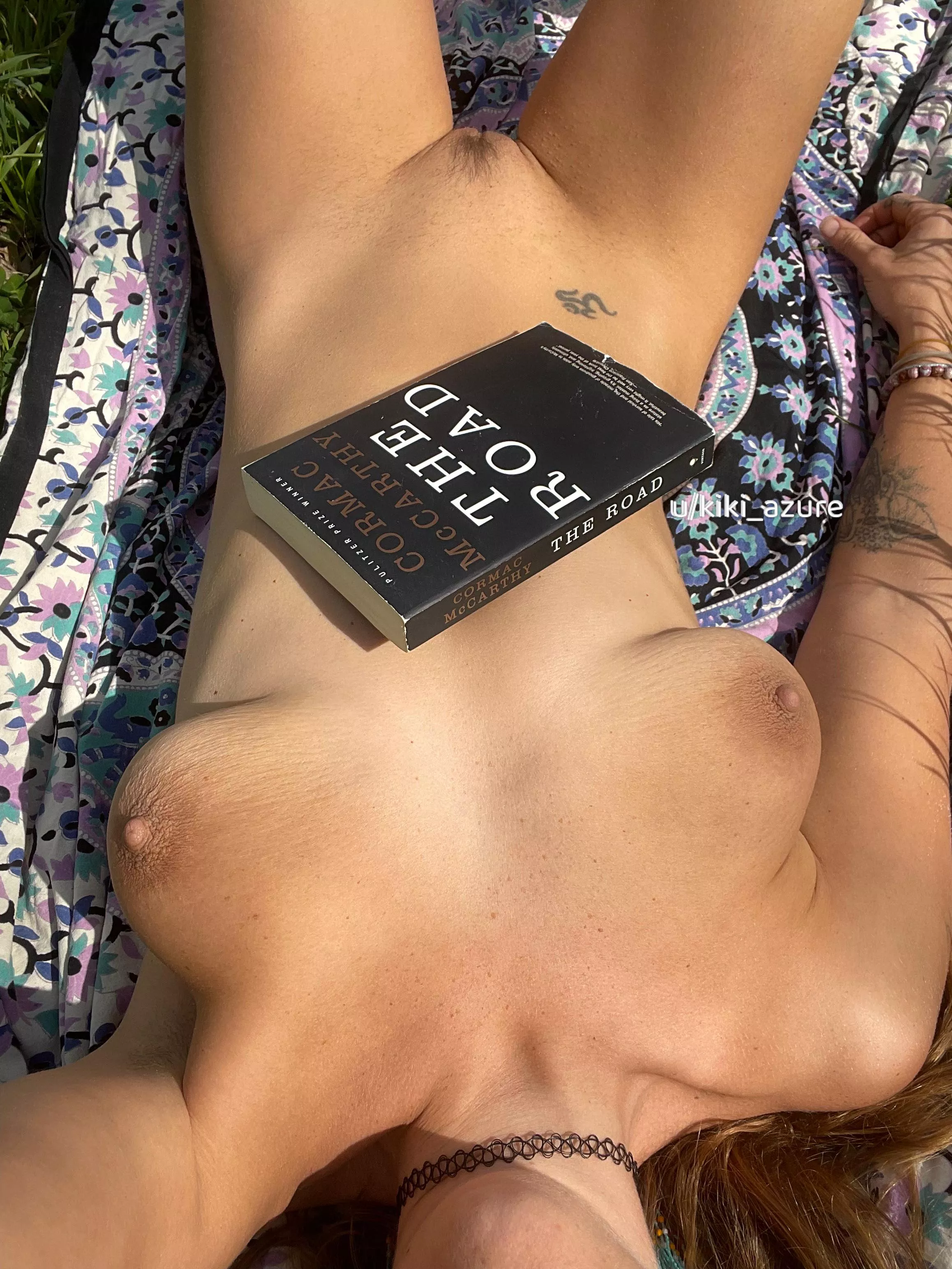 All I need is a good book and sunshine on my nude body
