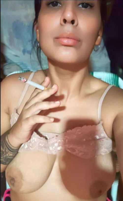 I love smoking and I have milk on my tits 