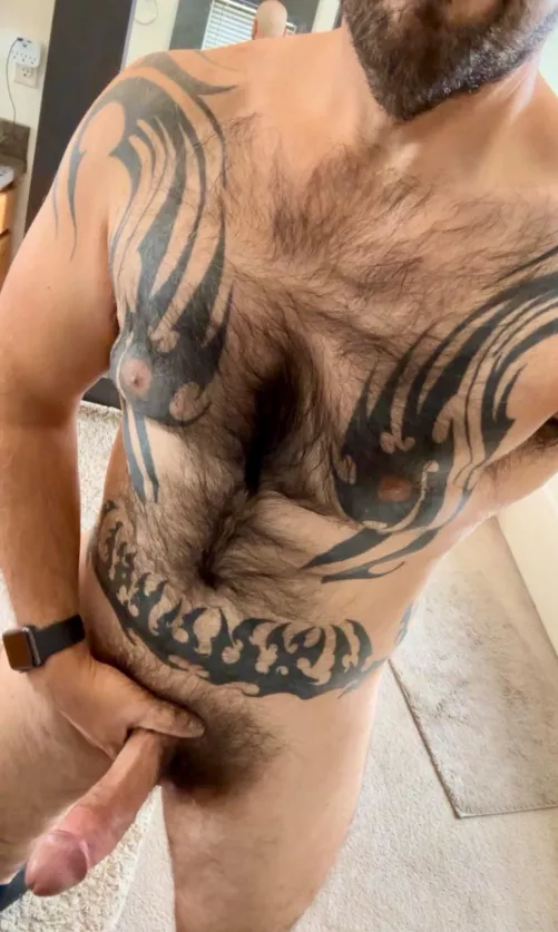 Insanely inked, insanely hairy, and insanely hung