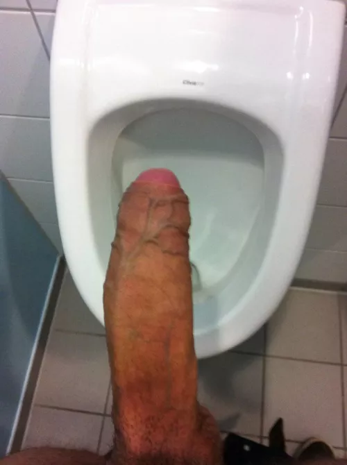 My urinal neighbour glanced over… and I got hard immediately.