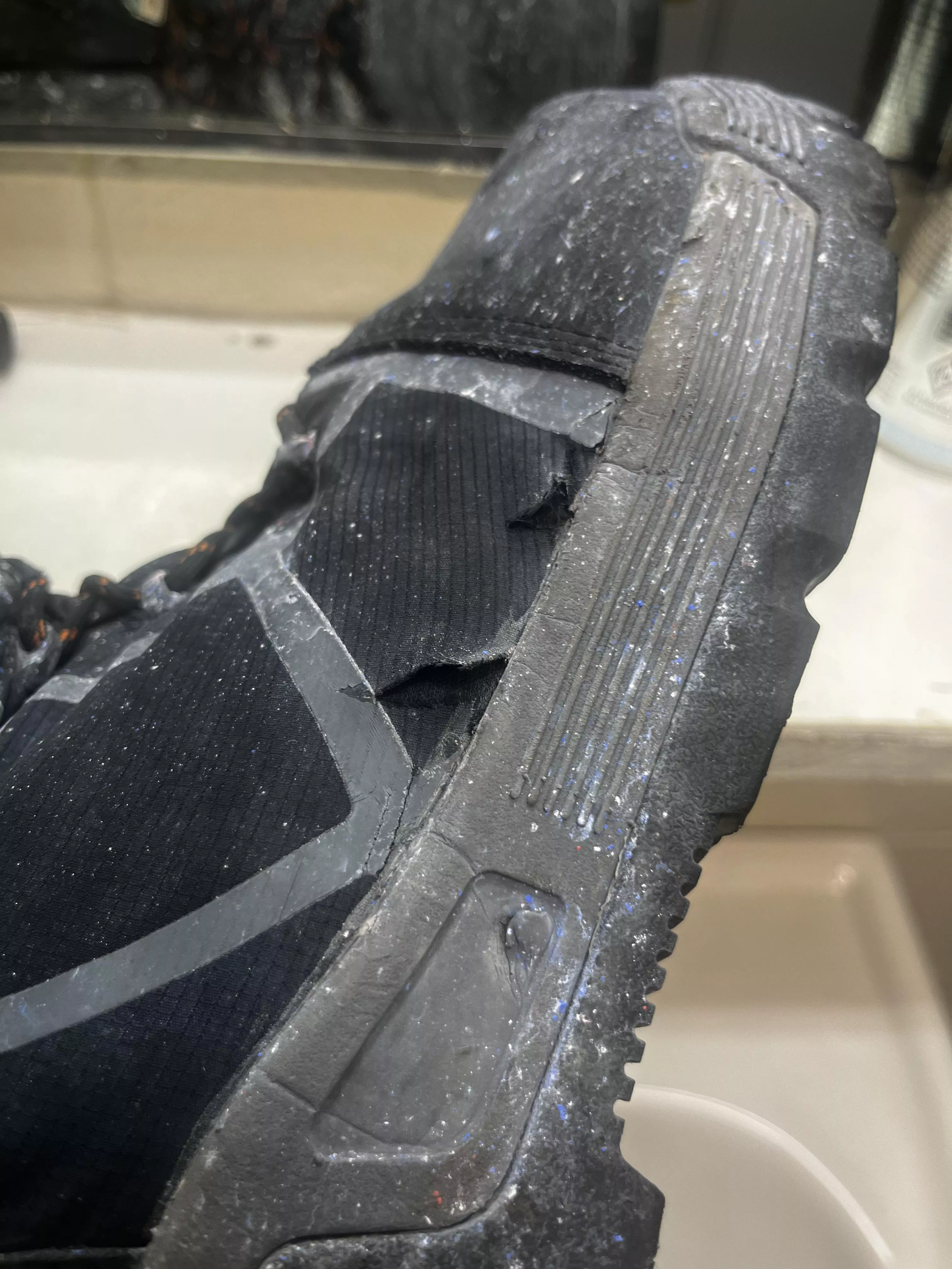 How can I repair these Helly Hansen boots that tore a little…