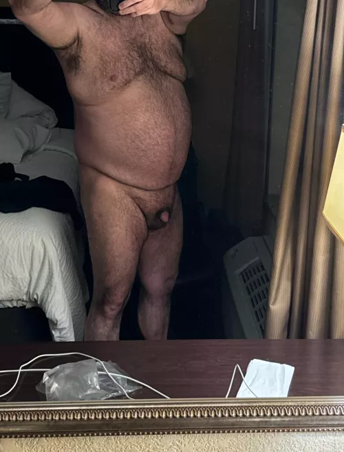 Standing in front of the hotel window 