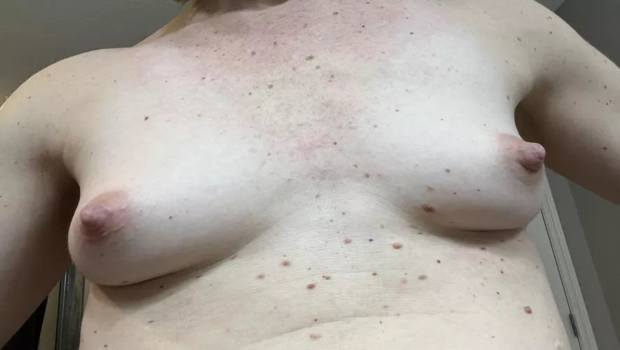 Showered and ready for the day. Tiny tits dont have to have a bra under my sweater..