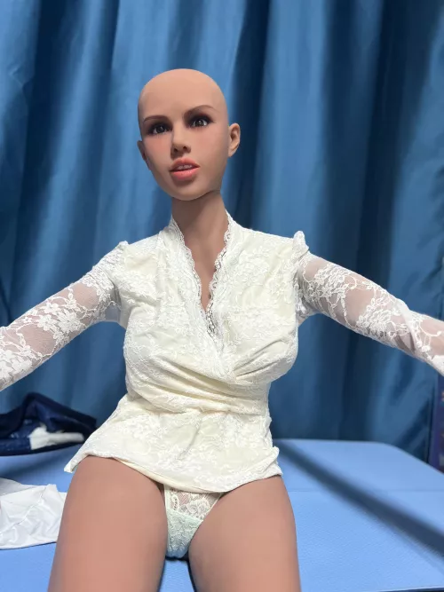 What do you think of this upper dress ? Is it suit her well ?