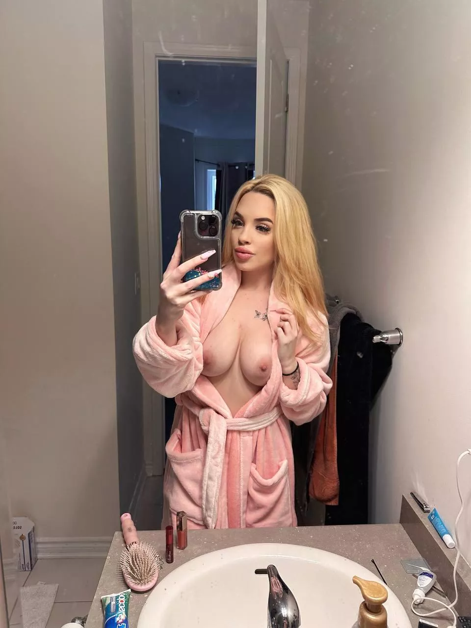 Care to suck my tits in the shower?