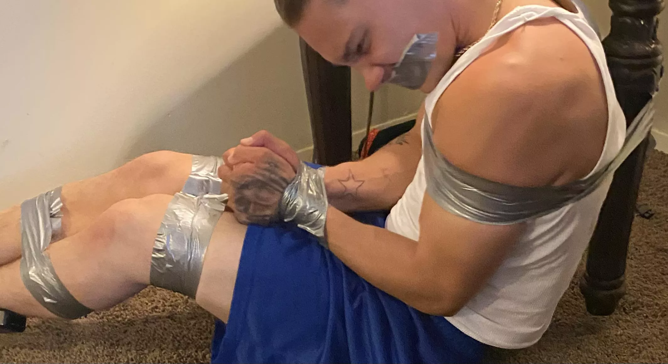 Defeated and taped up