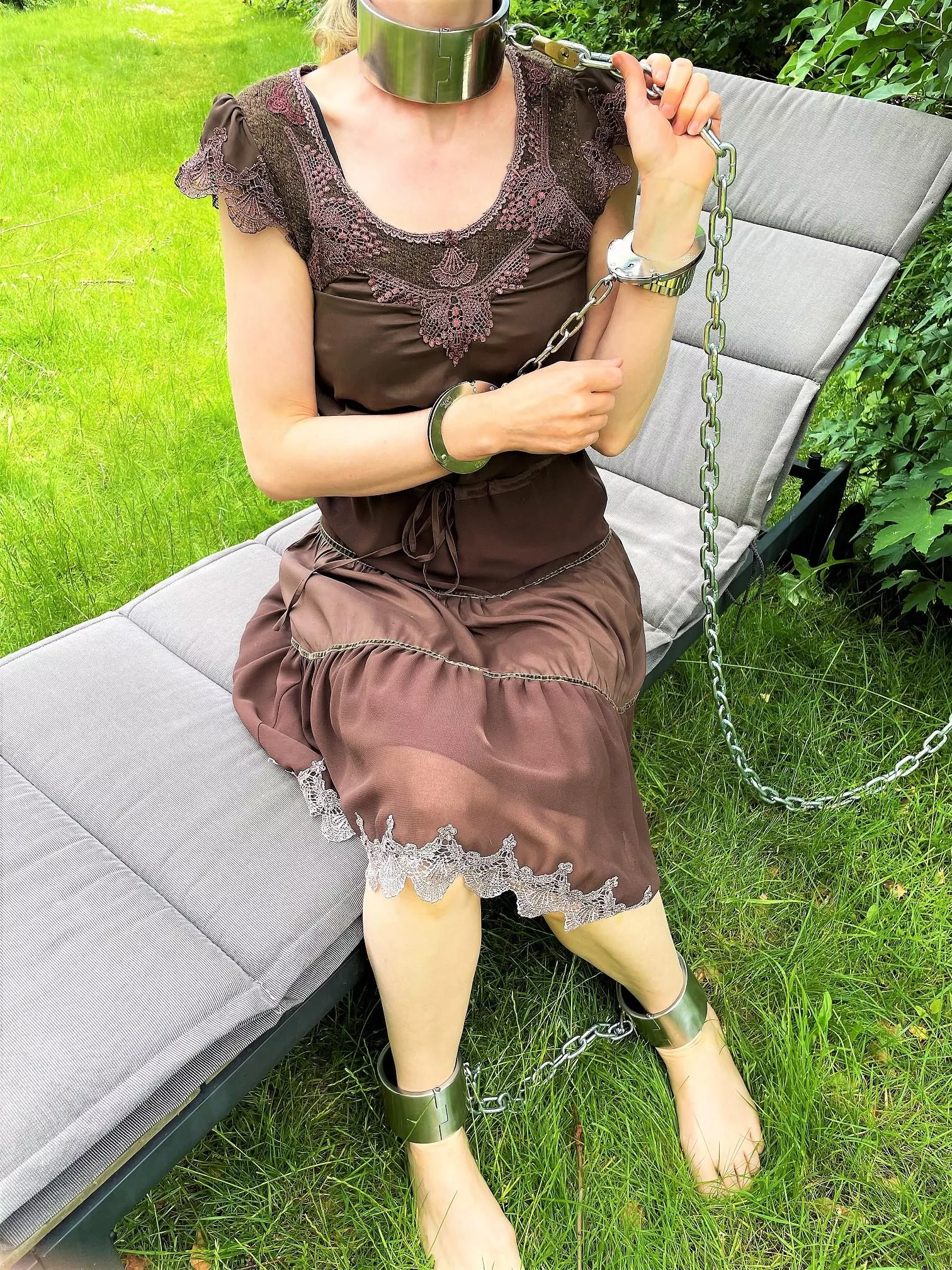 Fully chained in the garden (I might get some wierd tanlines from this...)