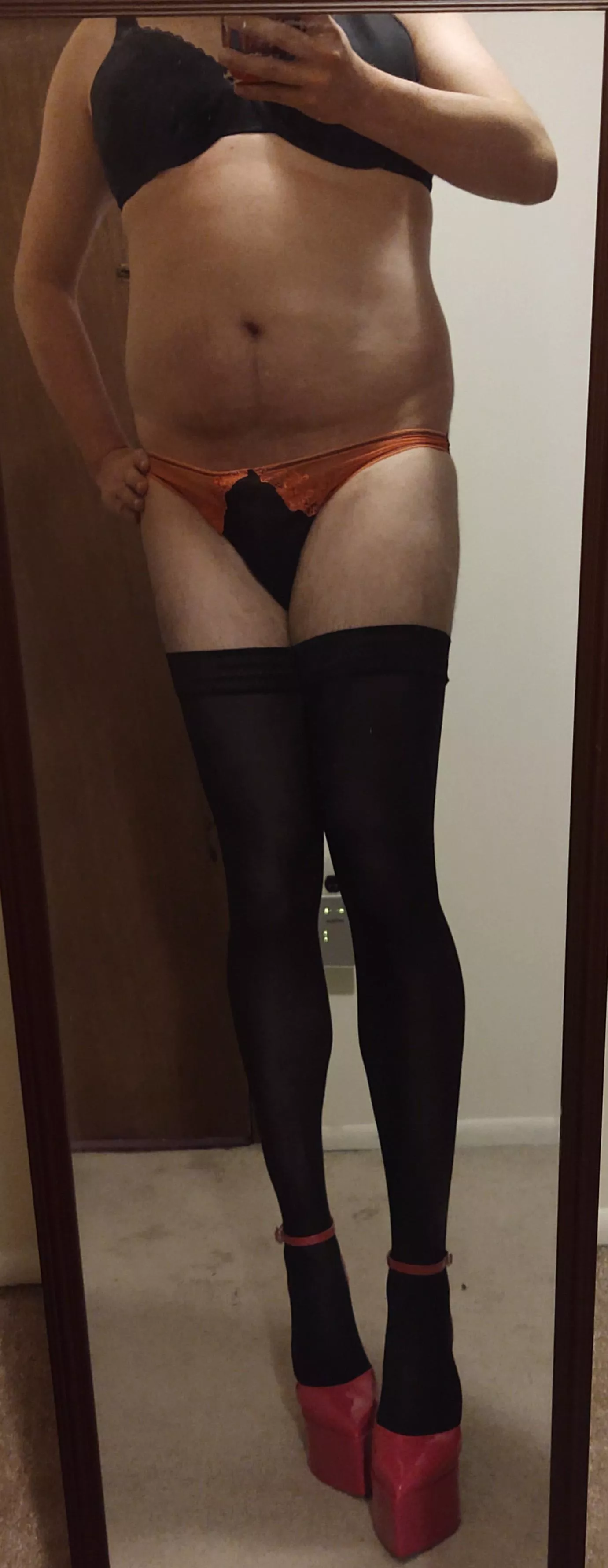 I was told to try black stockings with my pink heels 