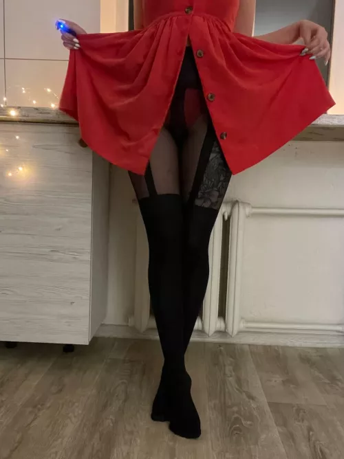 Is the red dress with black nylons mesmerizing?