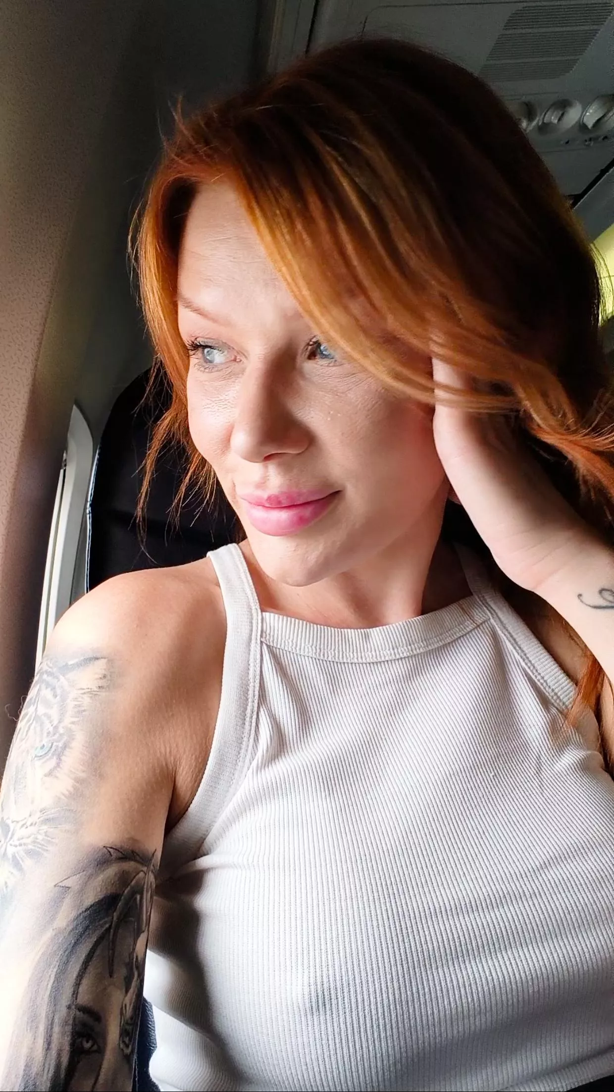 Braless on an airplane 