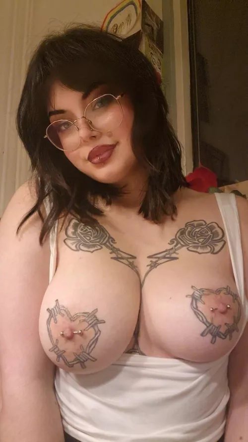 Serving you big pierced tiddies with a side of tattoos