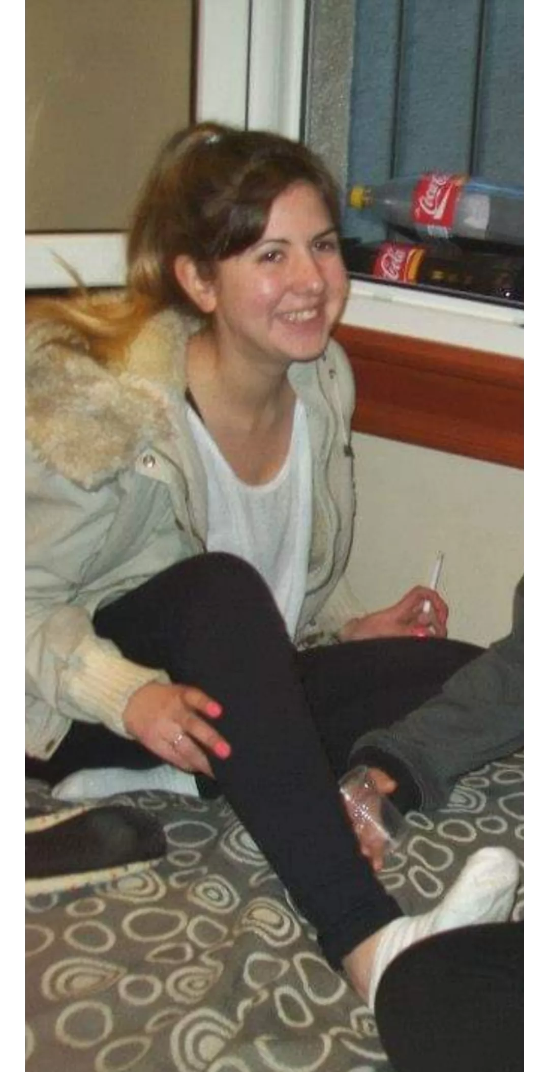 The smile of my friend after a long trip, she smokes her first cigarette in 20 hours...