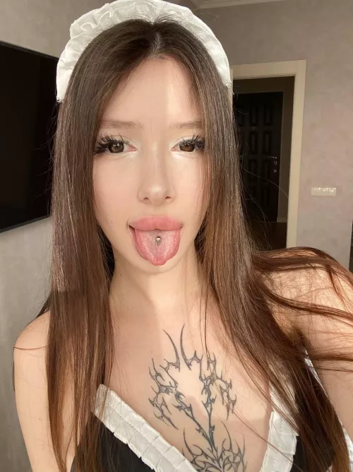 Where would you like to cum, on this tongue or on the tattoo on the chest?