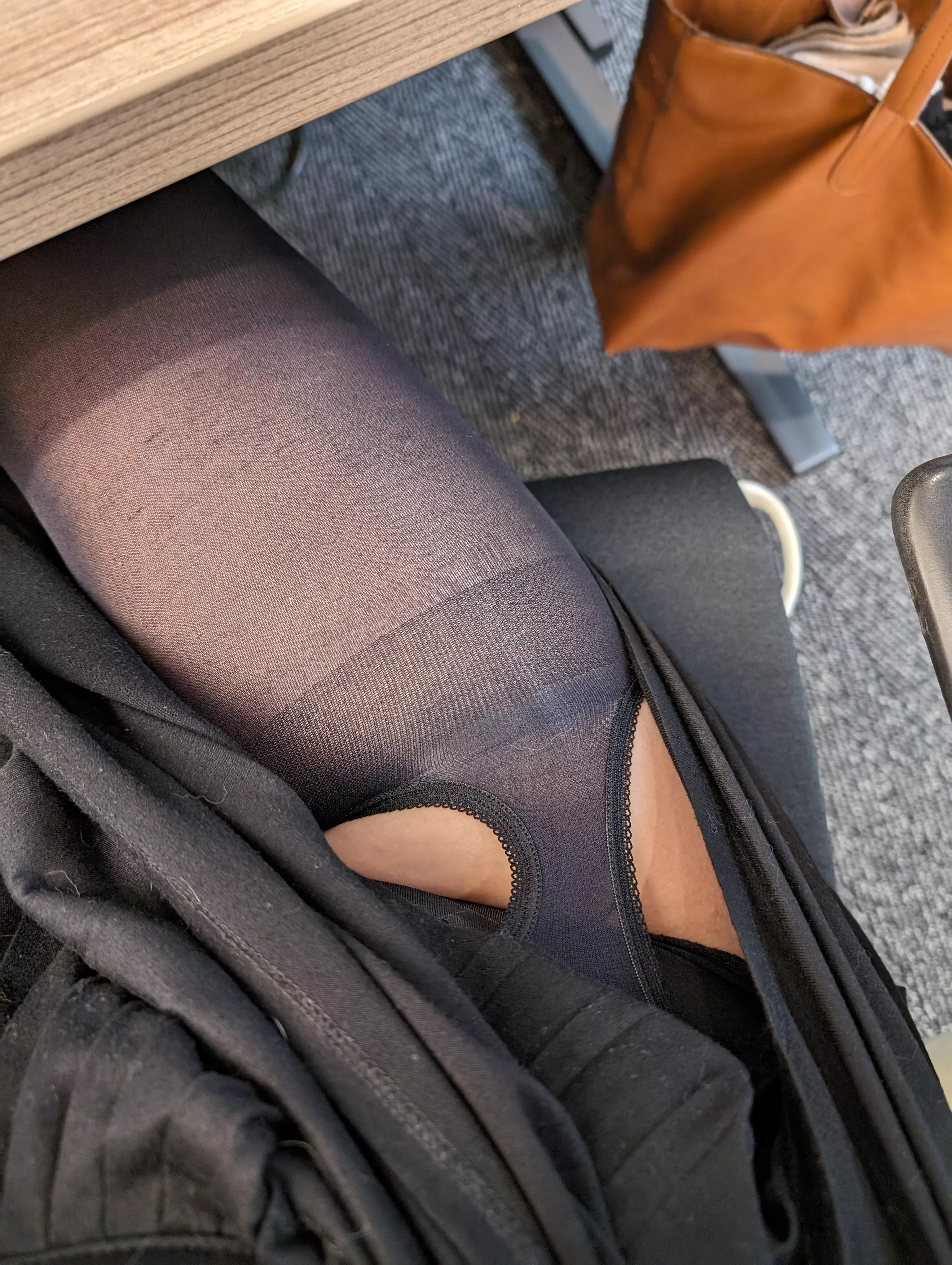 Hiding this pair of garter tights under my skirt last week