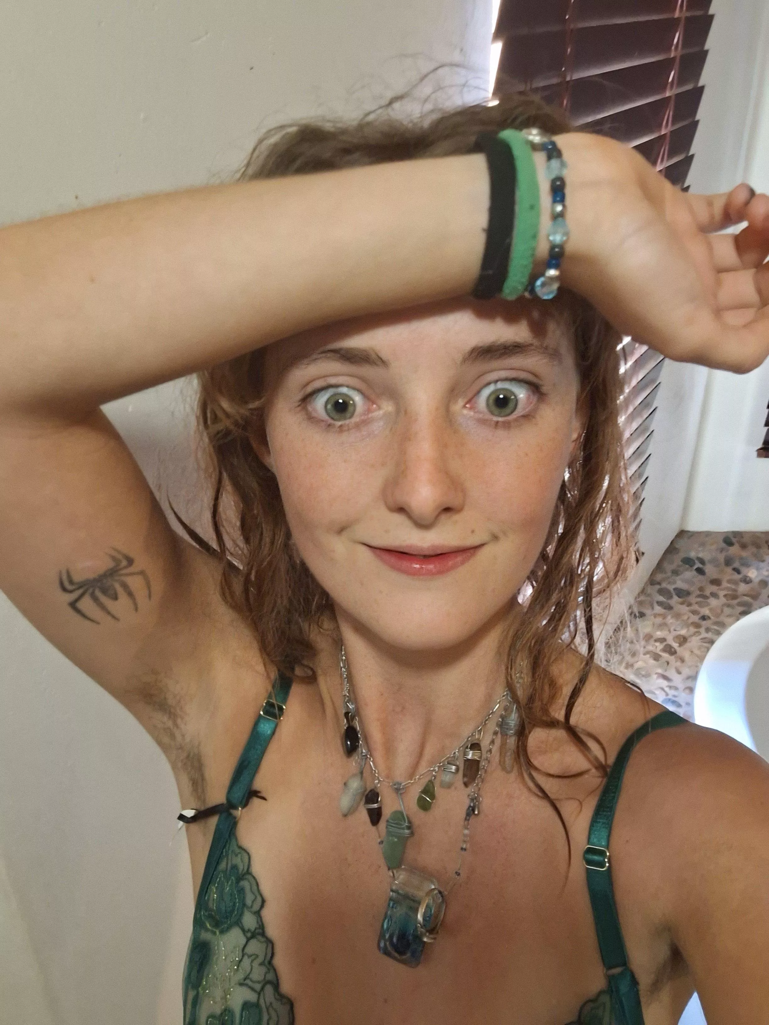 Playfully flaunting my cute armpit in a photo shoot. [18F]