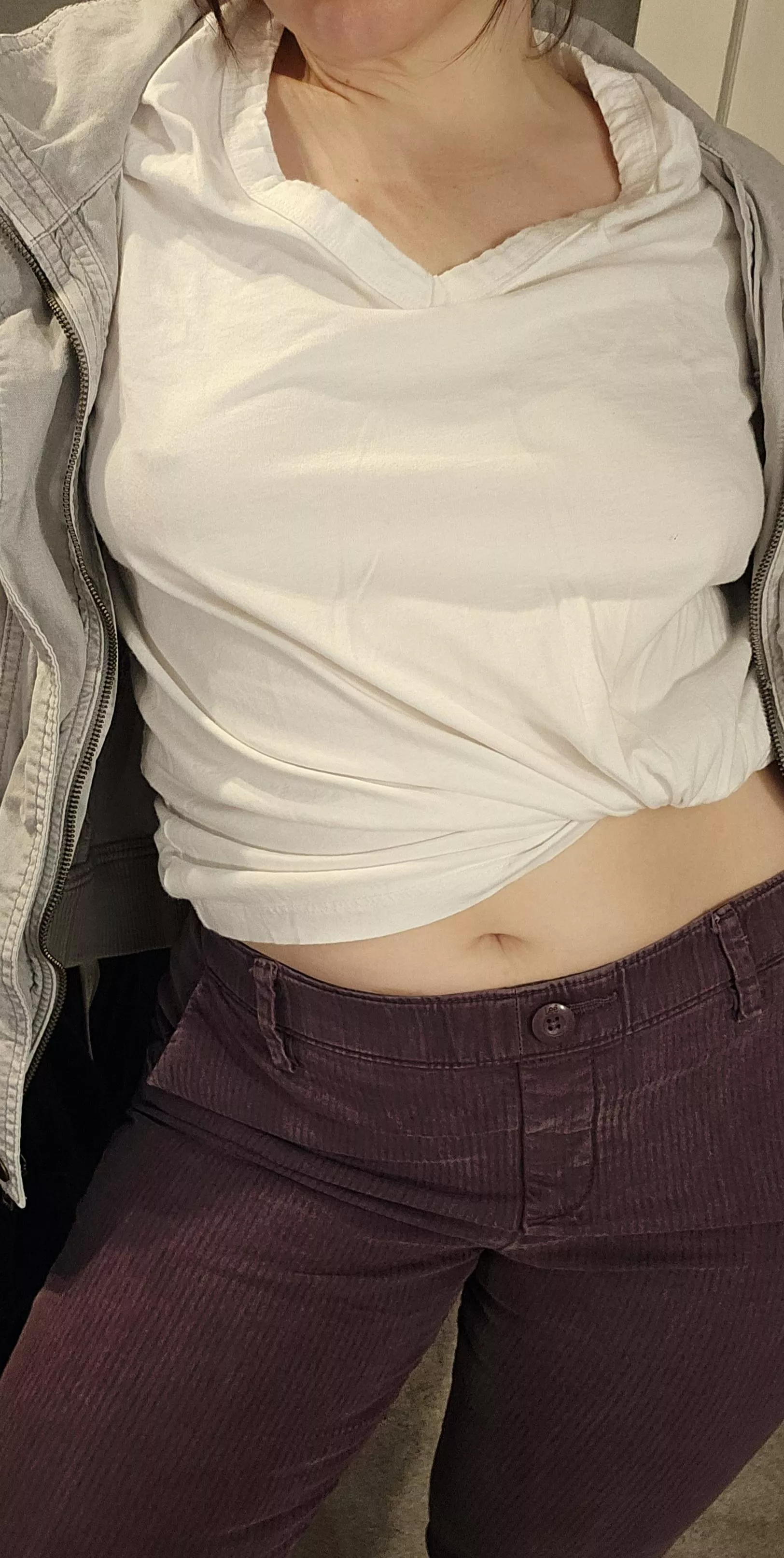 Braless in a white tee