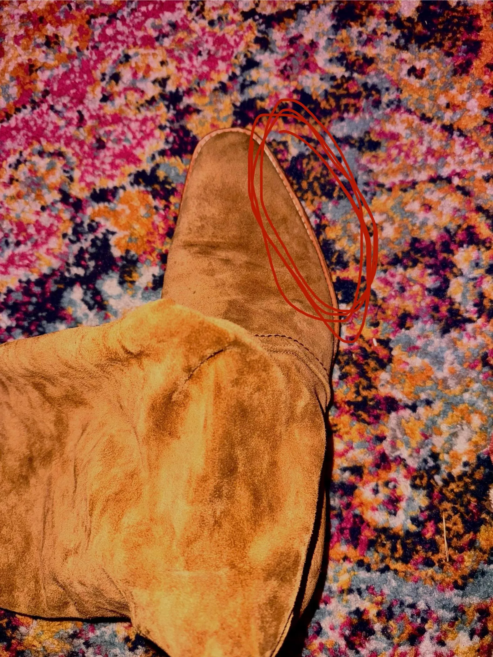 How can I soften the toe area of suede boots?