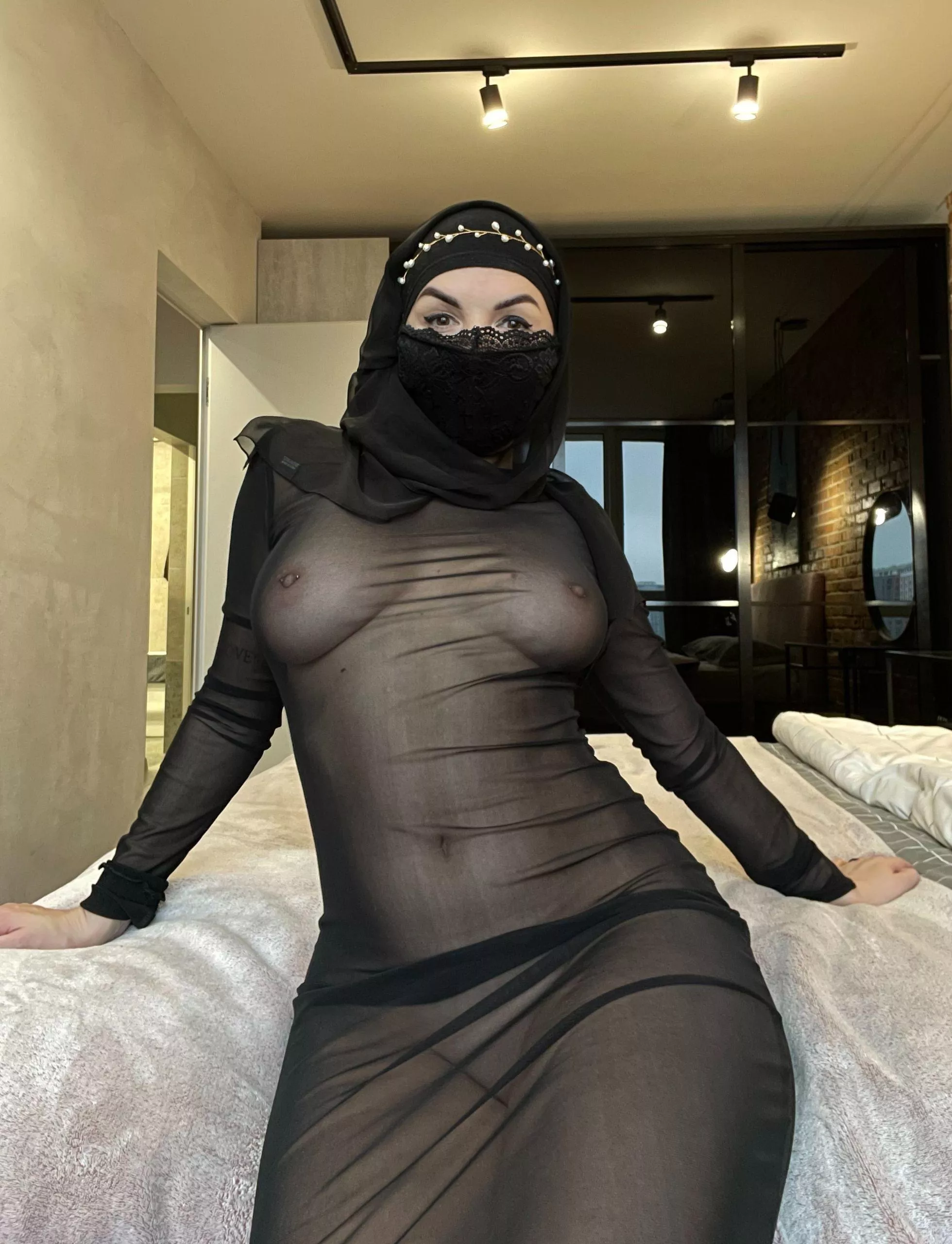 I like to striptease on my bed