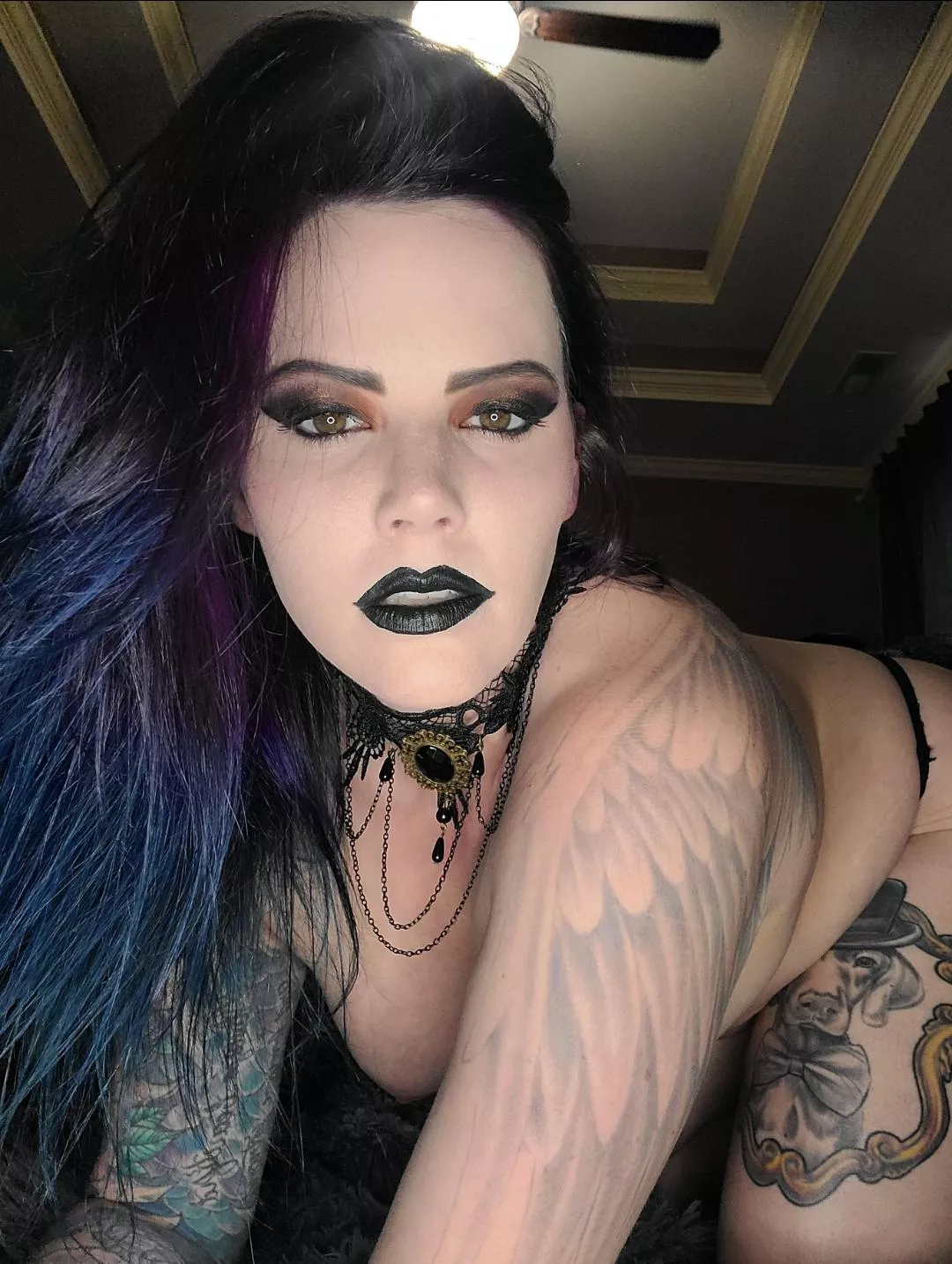 Your new goth mommy. Black lips are chefs kiss 