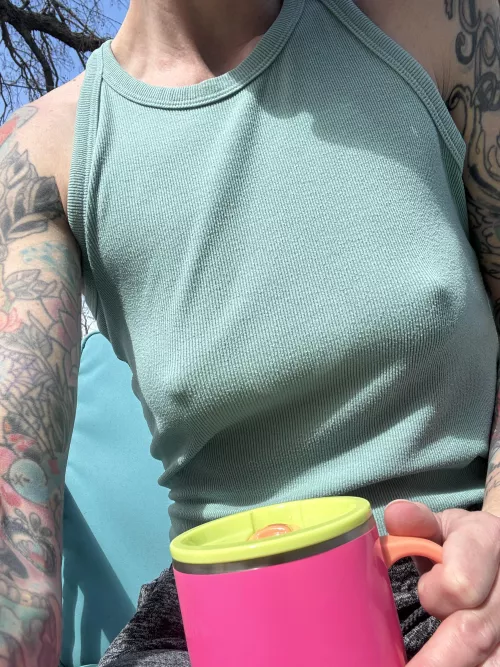 Enjoying my coffee, watching the traffic go by. 40f. 