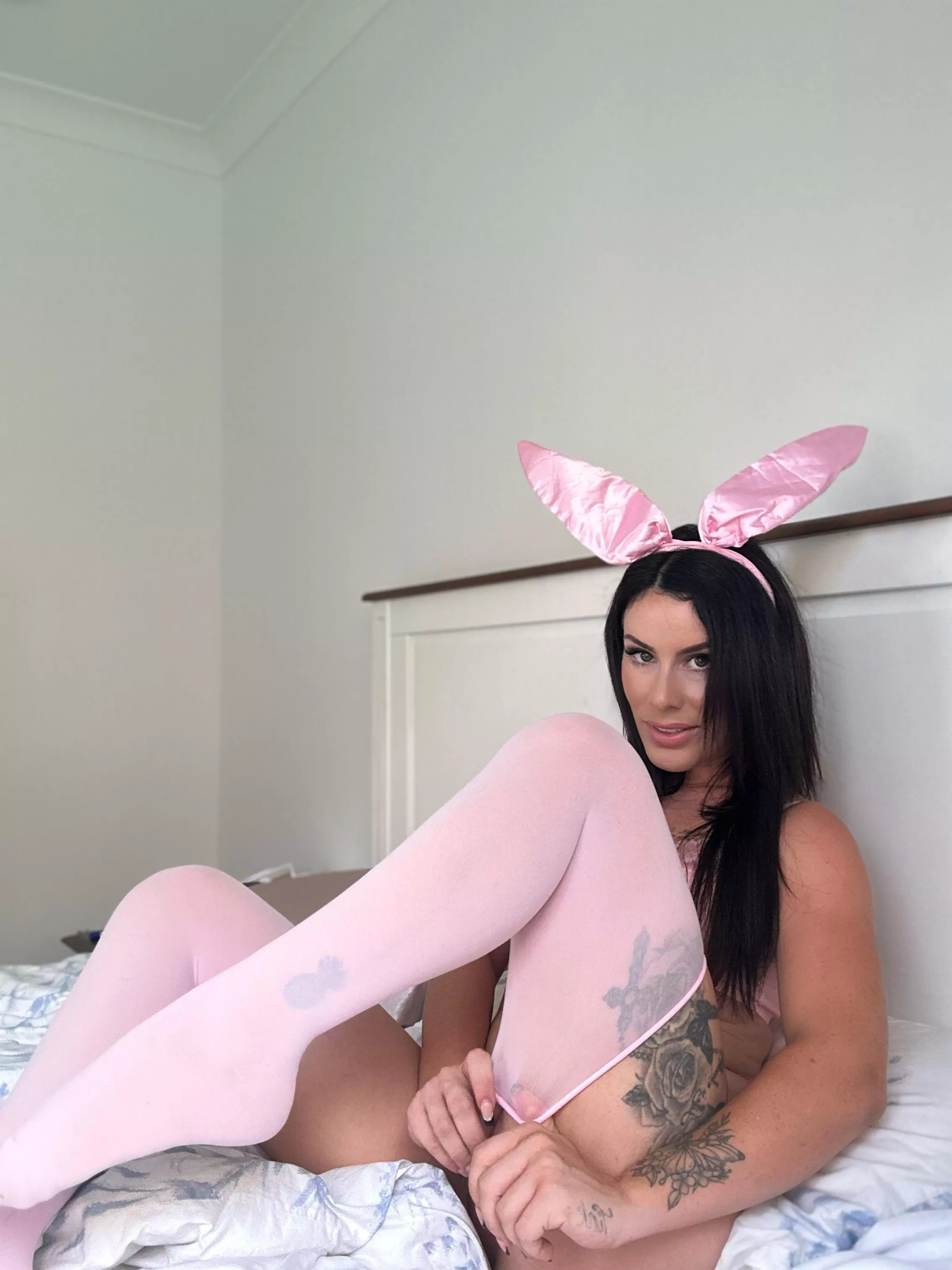 horny bunny chilling on bed and is waiting for a carrot!