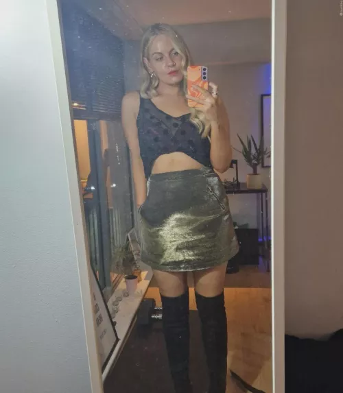 Sheer black polka dot top with a purple bra