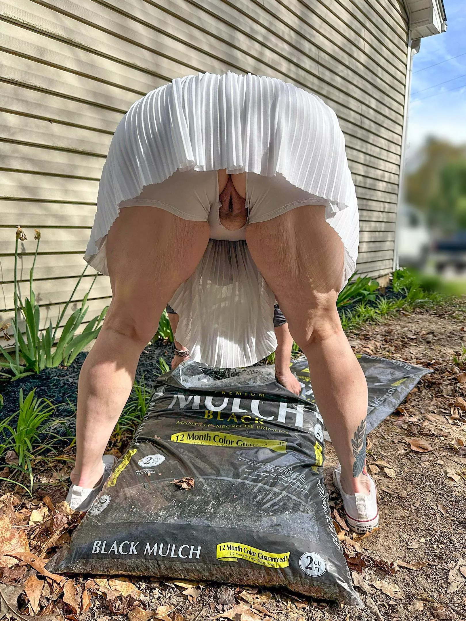 The neighbor guy keeps peeking over his fence. Maybe he will offer to help me!