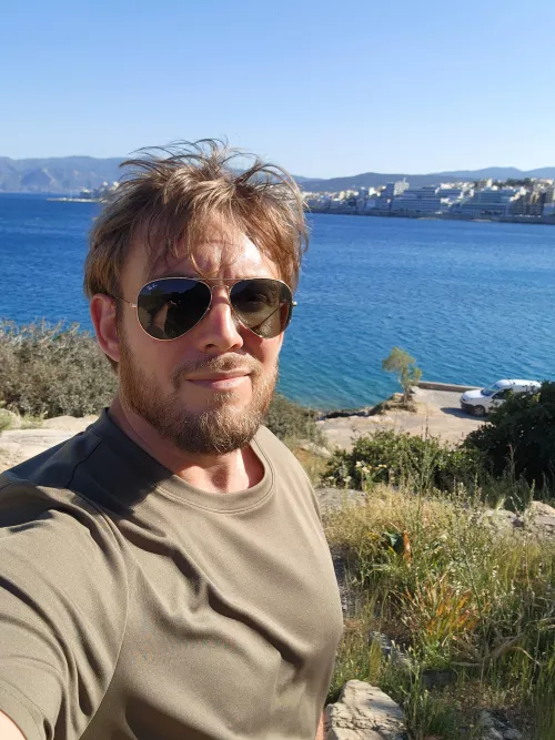 Just a guy walking by the beach