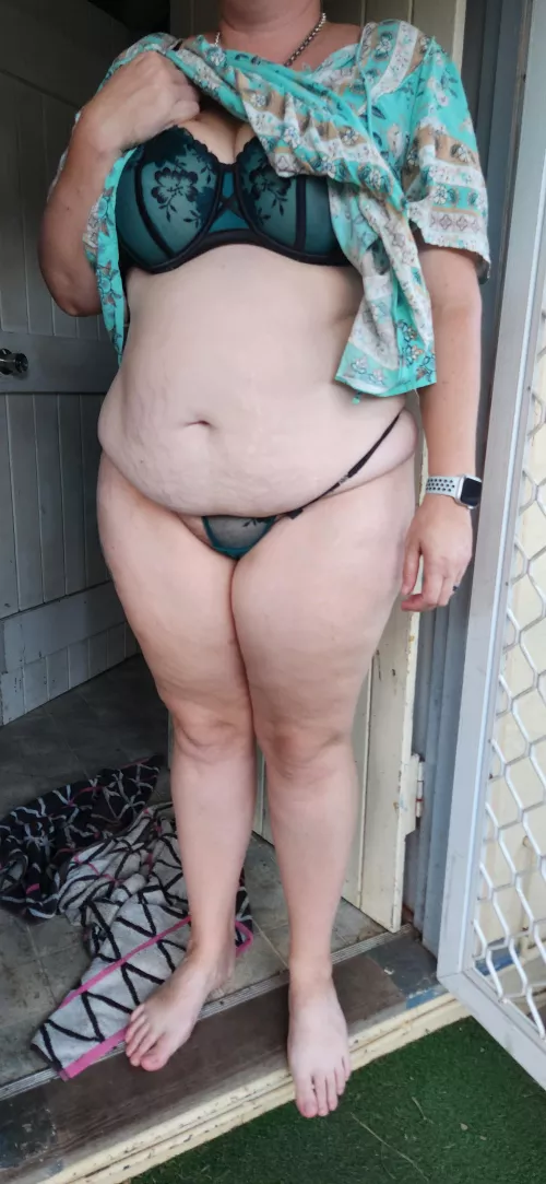 Showing the guy mowing my lawn my preggo belly