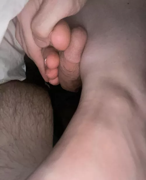 Her sleepy toes giving me a toejob 
