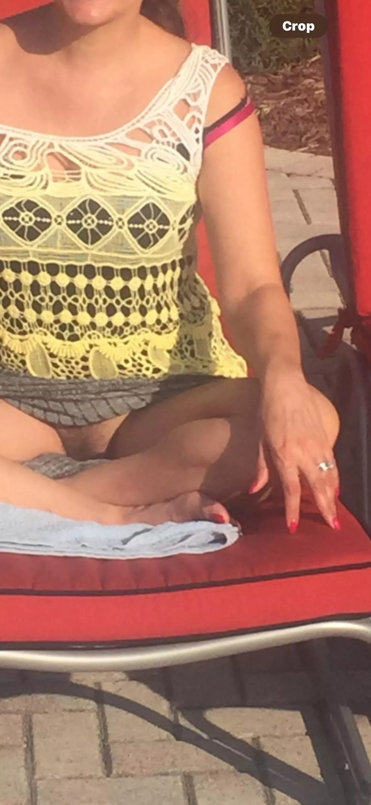 Sitting by the public pool 