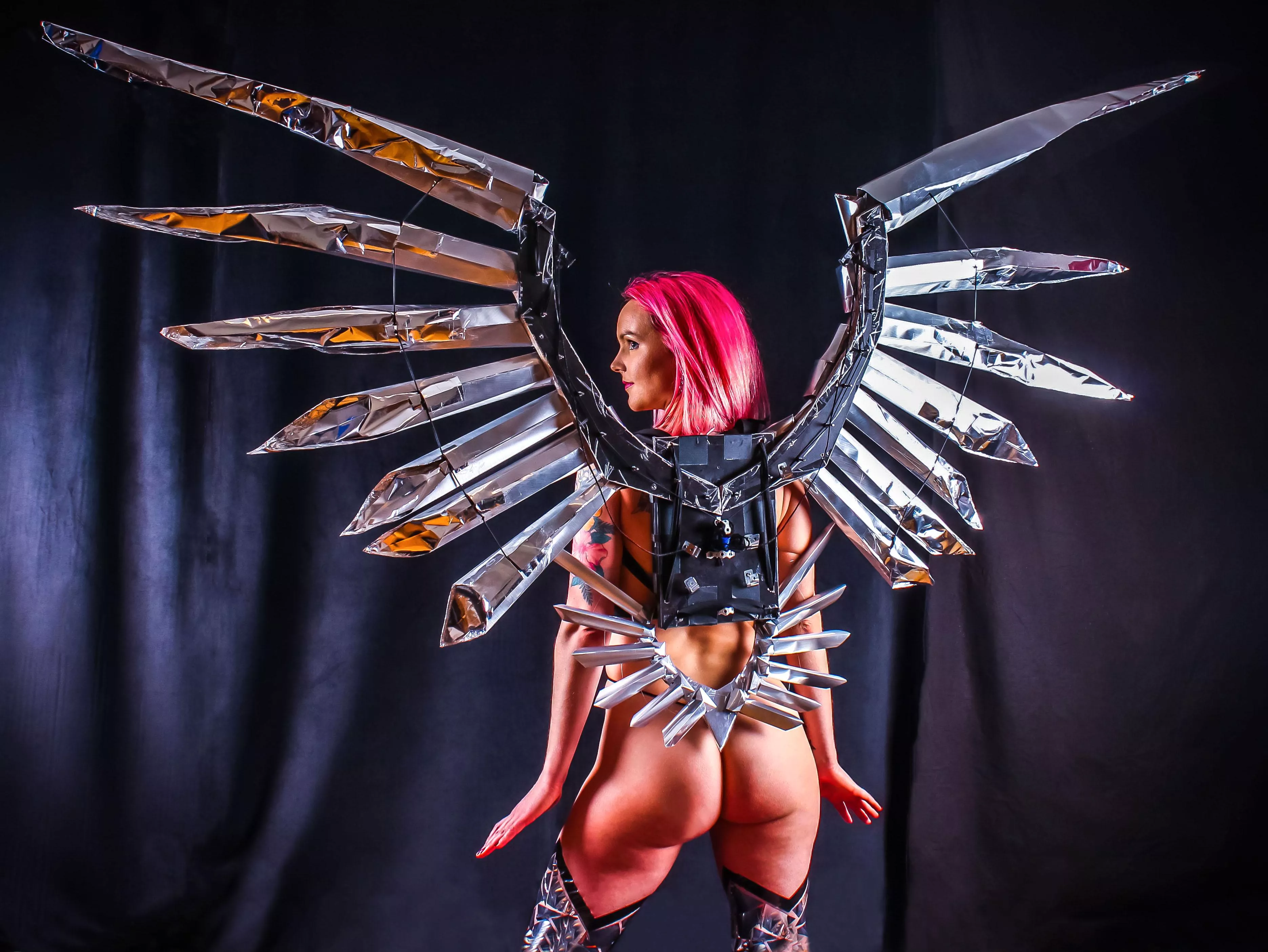 Swedish girl with silver cosplay wings