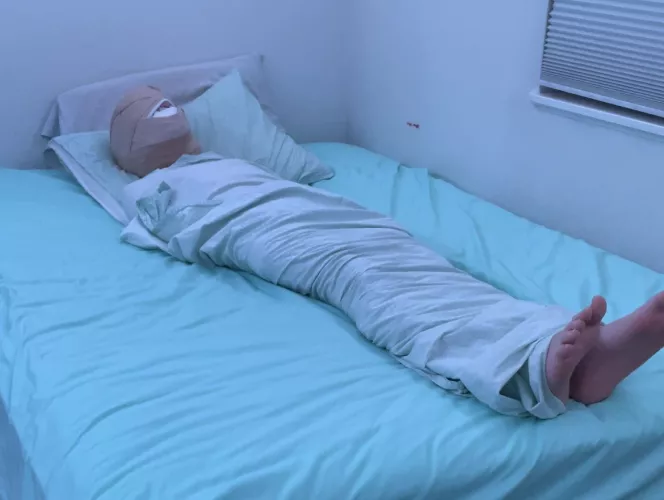 Me in my bed sheets,