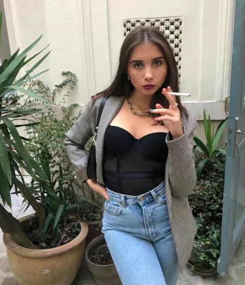 She’s sexy as hell and knows it