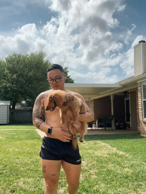 My weiner dog, Figaro and I, getting some vitamin D in my backyard. 