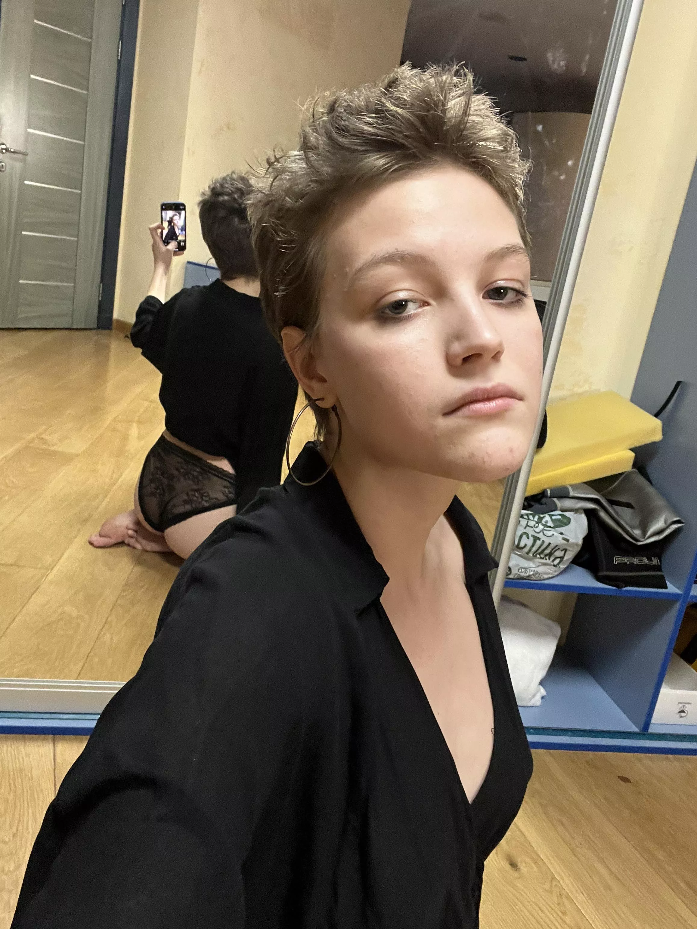 Tired in front of the mirror 