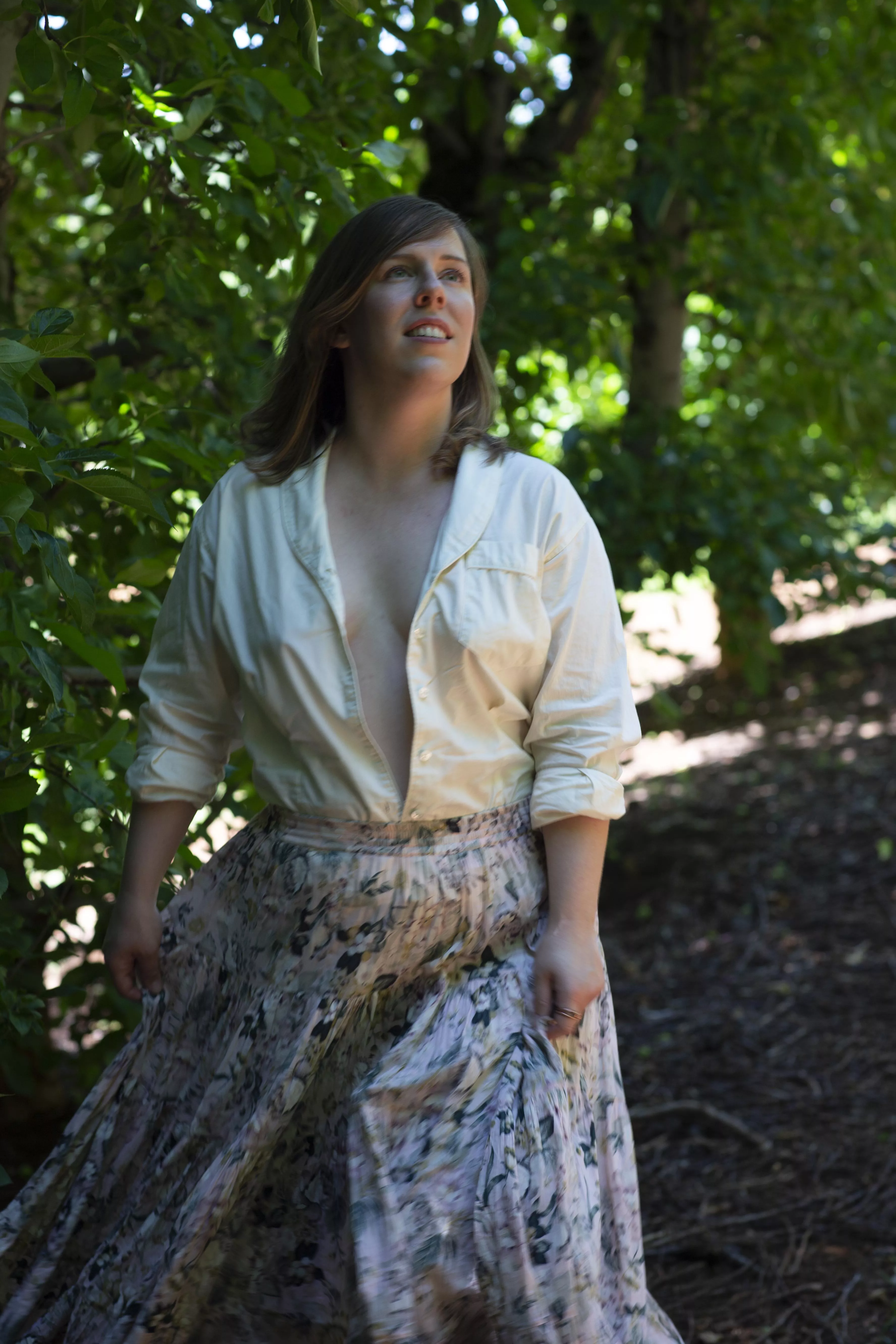 No bra and an unbuttoned shirt is paradise