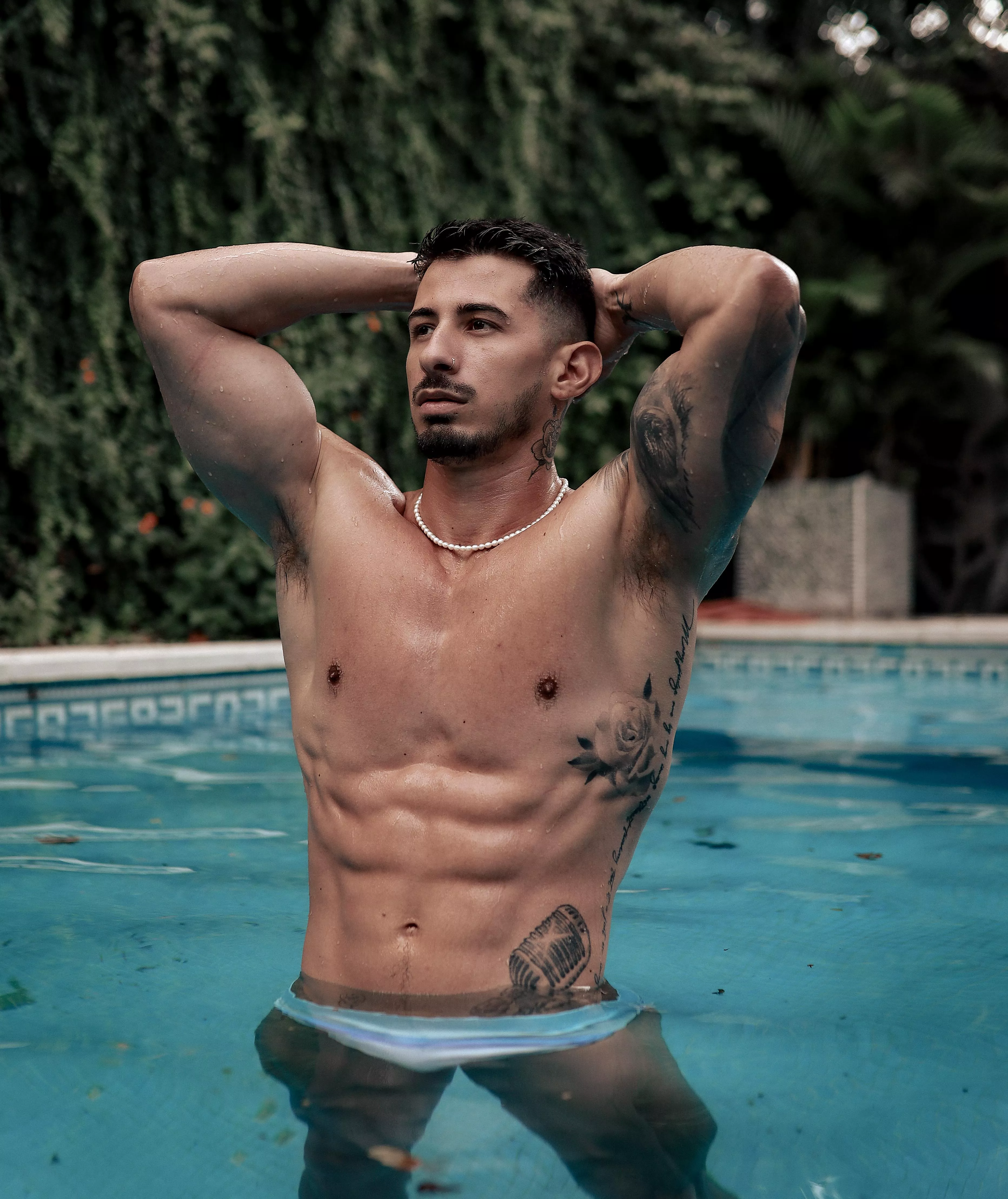 Showing of some Abs in the pool!