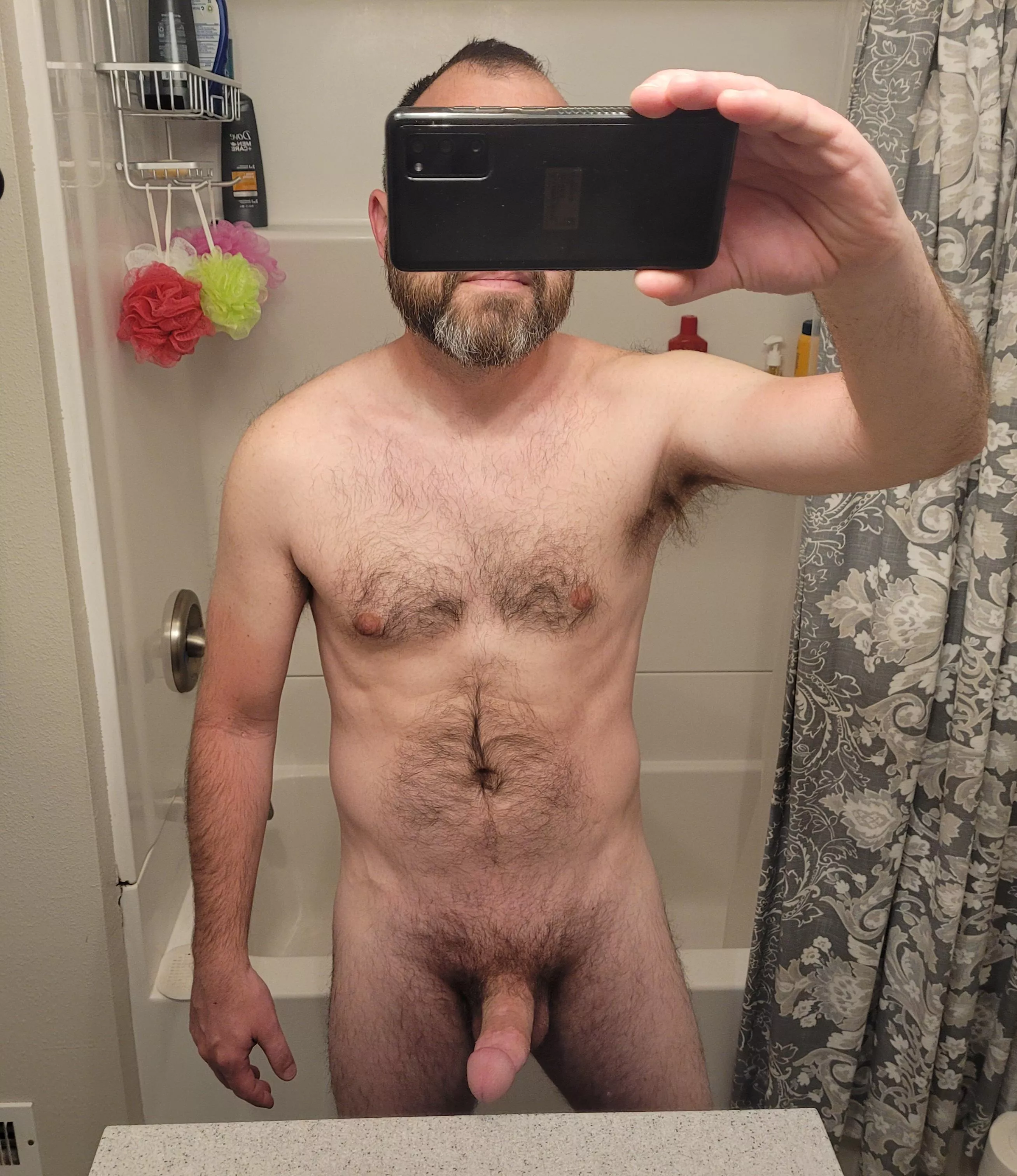 What I look like in the mornings taking a naked selfie in the mirror while hard. 