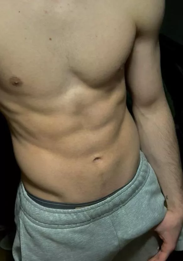 college stud in grey sweats after workout