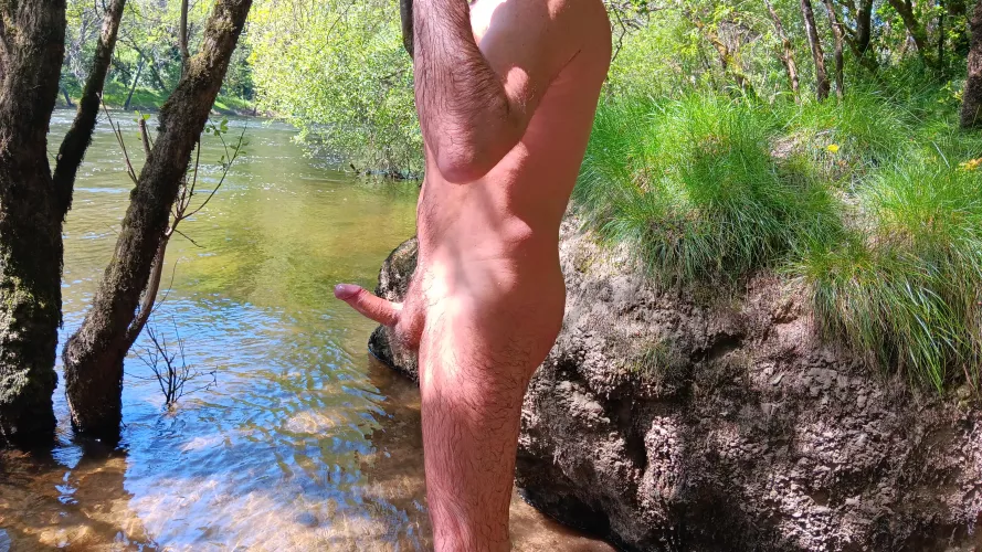 In the river. Wet body boner