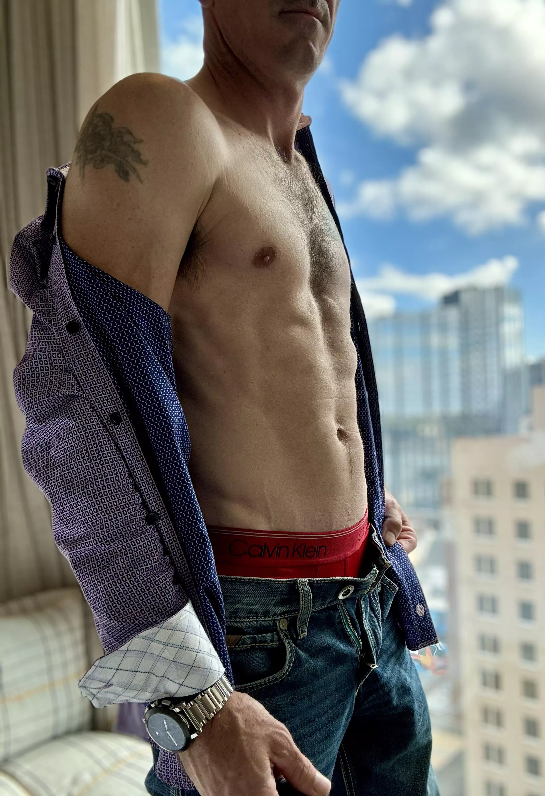 Let’s play a little game of find the tats, what are you taking off first to look? 