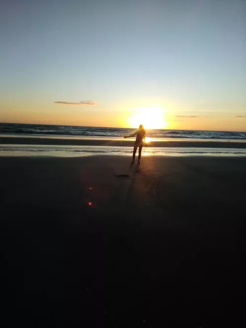 On the beach watching the sunrise