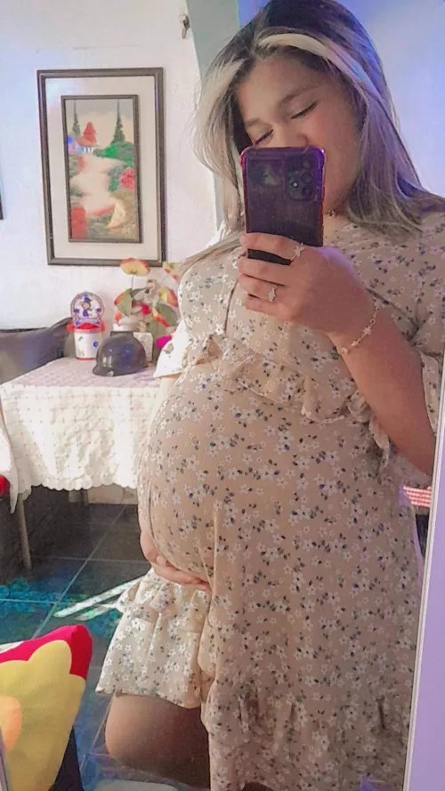 Pregnant girl with a beautiful belly 