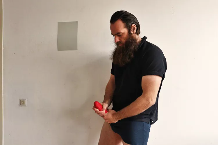 Me, while I'm holding a red 10,5 inch dildo in front of me