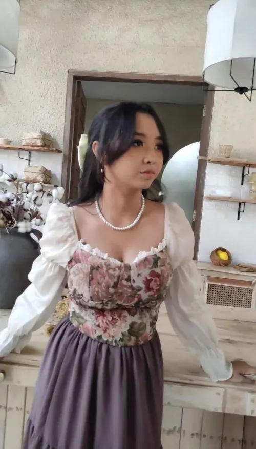 She looks classy in that dress