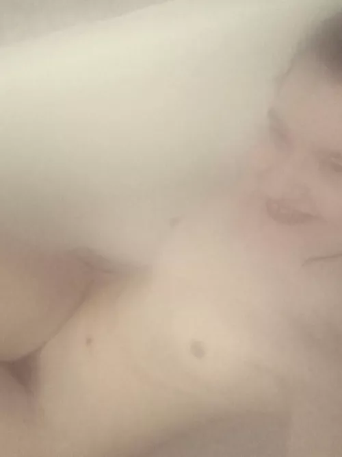 Girl naked in the bath